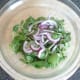 Combining chicken salad ingredients