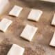You can use a knife. I just cut the cookies into a square shape.