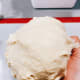 If the dough too sticky, add one tablespoon of flour at a time.