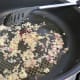 Saute the shallot and garlic in olive oil