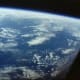 Photo of earth taken by John Glenn from orbit. Photo courtesy of NASA.