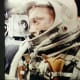 Onboard camera photographs John Glenn while in orbit. Photo courtesy of NASA.