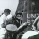 Wally Schirra exits Sigma 7 onboard the USS Kearsarge. Photo courtesy of NASA.
