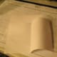Take a 8.5"x11" piece of paper, and fold it in half.