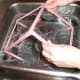 Dip the cube into the bubble solution