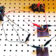 Using a third connector wire, attach the clip to the first bulb from the switch and the other end of this wire to the knife switch.