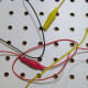 Alligator clips of various colours.