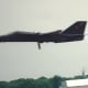 An F-111 making a low level pass at Andrews AFB, MD, May 1991.