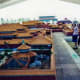 People looking at the scale models of the buildings in the Forbidden City in China