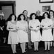 The quints as young women.