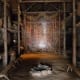 Inside a 15th century Iroquois Longhouse in Ontario, Canada. Notice the wooden benches used.