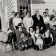 This photo shows Julia with her family in 1933. She is in the front row (see arrow), holding her nephew, David Crotta.