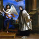 This is a detail of a painting by Guercino, titled the Vocation of St. Aloysius. St. Aloysius is shown renouncing the crown for the Cross.