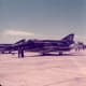 A USAFF-4 Phantom II with camouflaged paint scheme and subdued USAF roundel.