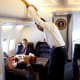 President Barack Obama aboard a C-32A, which gave it the radio call sign "Air Force One".