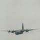 A C-130 during a fire retardant demonstration, Andrews AFB, MD.