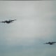 C-130s during a mass parachute jump.