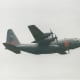 A C-130 during a fire retardant demonstration.