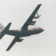 A C-130 during a fire retardant demonstration.