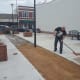 Volunteers laying the sand base