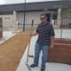 Julie Jenkins and Eric Standridge laying the sand base