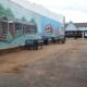 Ripping out planters and other fixtures inside the Poteau Pocket Park (Town Square)