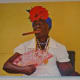 Woman smoking a cigar in Cuba Behind Open Doors by Kevin Douglas West