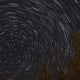 The North Star appears in the center of these stars because of its alignment to the North Pole.