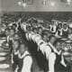 Students at a meal in the Girls' Boarding Department