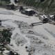 Flood-damaged bridge, Pakistan. Image courtesy US DOD & Wikimedia Commons.