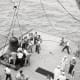 Faith 7 is brought aboard the recovery carrier, the U.S.S. Kearsarge. Photo courtesy of NASA.