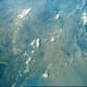 Photo of earth taken from orbit by Gordon Cooper aboard Faith 7. Photo courtesy of NASA.