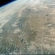 Photo of earth taken from orbit by Gordon Cooper aboard Faith 7. Photo courtesy of NASA.