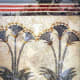 Again reminding us of Akrotiri's cosmopolitan nature, one house is decorated with elegant papyrus fronds in the style of Egyptian art. I've seen this room: right next to the papyrus is painted a Minoan lady in elegant attire.