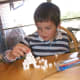 3. Experiment with adding more sugar cubes on top or making different kinds of arches.