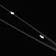 Shepherd moons Prometheus (right, inside ring) and Pandora (left, outside ring) keep many of Saturn's rings in line. Or in this case, kinky. I remember when Voyager first discovered this ring, the F ring, whose "braided" shape puzzled scientists.