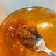 Add the curry paste into the boiling water.