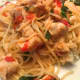 Gently fold pomodoro sauce and Parmesan cheese into the pasta just before serving.