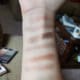 Finger and brush swatches from the right side of the palette (mostly browns and greens). From top to bottom: Myth, Magic, Wings, Marvel, and Trance.