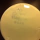 This photo shows the Haeger maker's mark on the bottom of a piece of midcentury pottery.