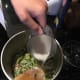 Adding the milk and spices.
