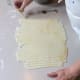 Once you have cut the whole piece of dough, you are ready to put the pie filling into the bottom crust and begin the lattice work.