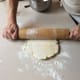 First roll one way, then flip dough over and roll the other way.
