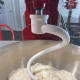 Use a hook attachment to mix the ingredients at a low speed.