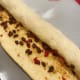 Tightly roll up the dough and cut into 12-14 pieces.