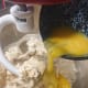 Combine the lightly beaten egg into the mixture.