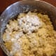 adding a bit of flour will make it melt less and the inside will remain more dry. Avoid it if you have allery