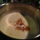 I've tried to add cinnamon and honey soon after the white of eggs have whip up