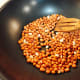 Roast the peanuts in a pan without oil.