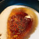 Let the sugar melts into caramel by its own. Do not stir the sugar with a spatula.